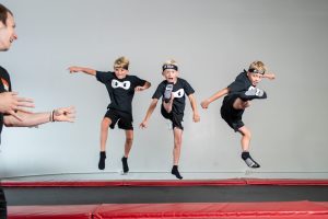 <font color="cb0000"><strong>Saturday and Sunday Classes Available</strong></font>
<p>NinjaZone is a fusion of obstacle course training, gymnastics, and character building. These programs are the foundation of whole-body movement and the mind-body connection. Children build strength, agility, and learn at their own pace. Ninja UNIFORMS are required for this class and can be purchased at the office on your first day of classes.